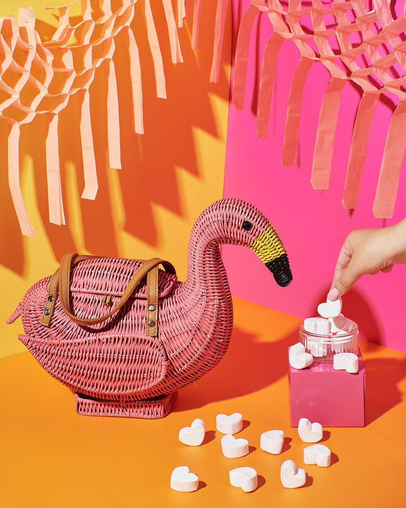 handbags online Australia Wicker Darling chile flamingo shaped handbag sits in a cute flamingo pink background