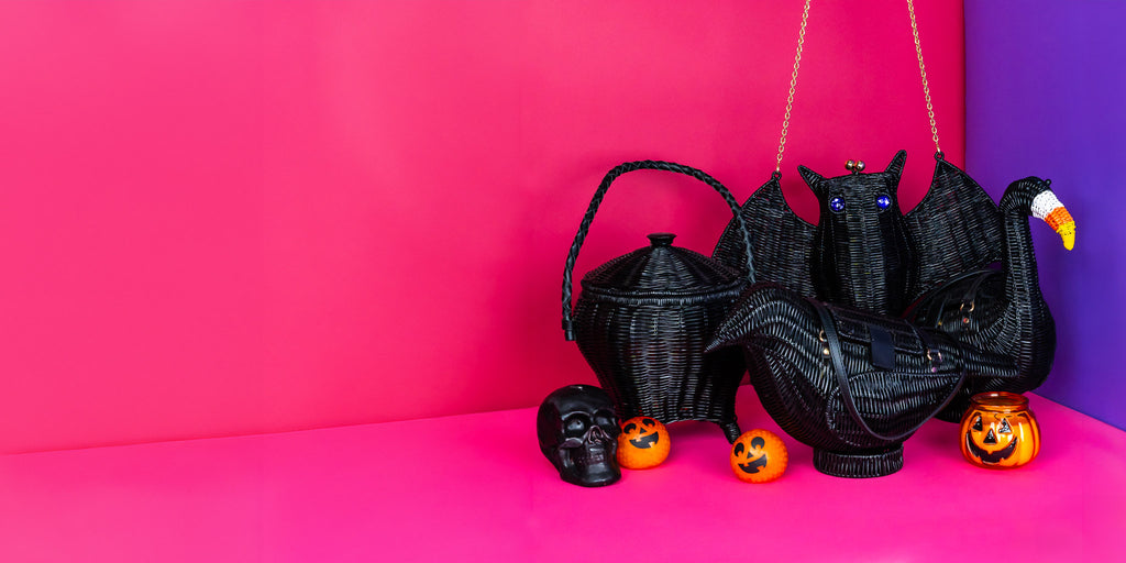 Wicker Darling Halloween handbag collection halloween purses sit in a colourful background