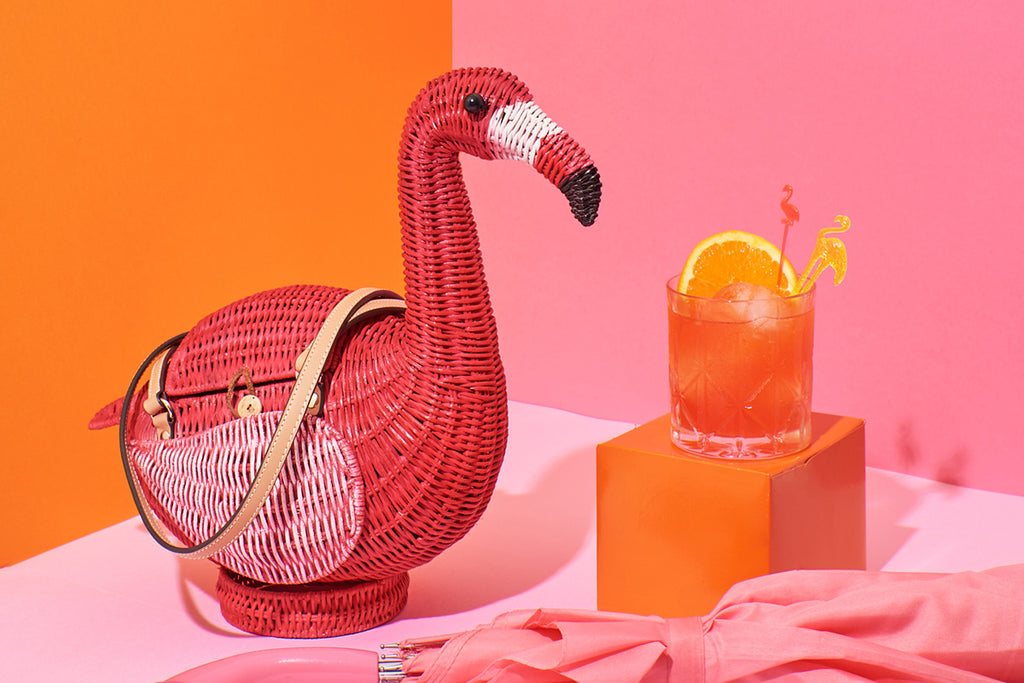 Animal Shaped Purse Wicker Darling flamingo montoya the flamingo purse sits in a colourful pink background
