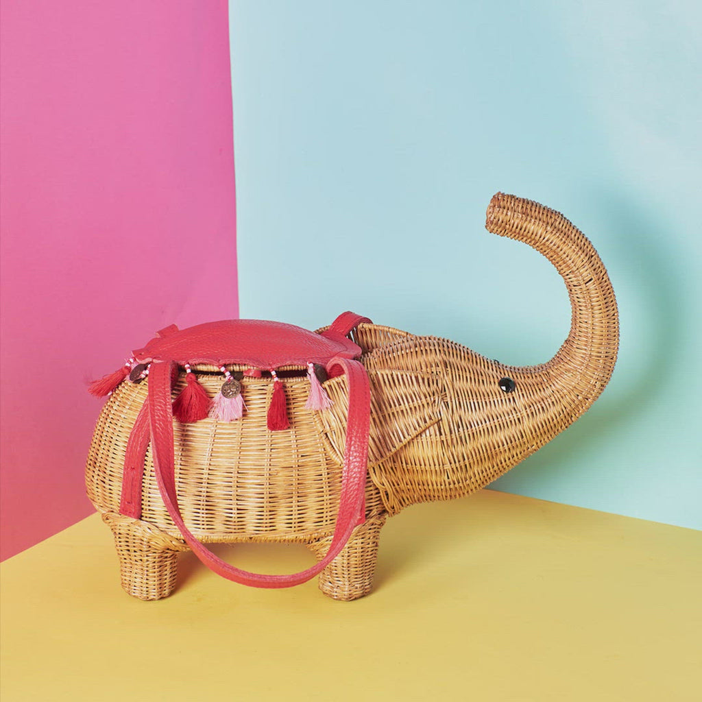 Wickerv darling wicker Elephant bag elephant purse in a colourful room