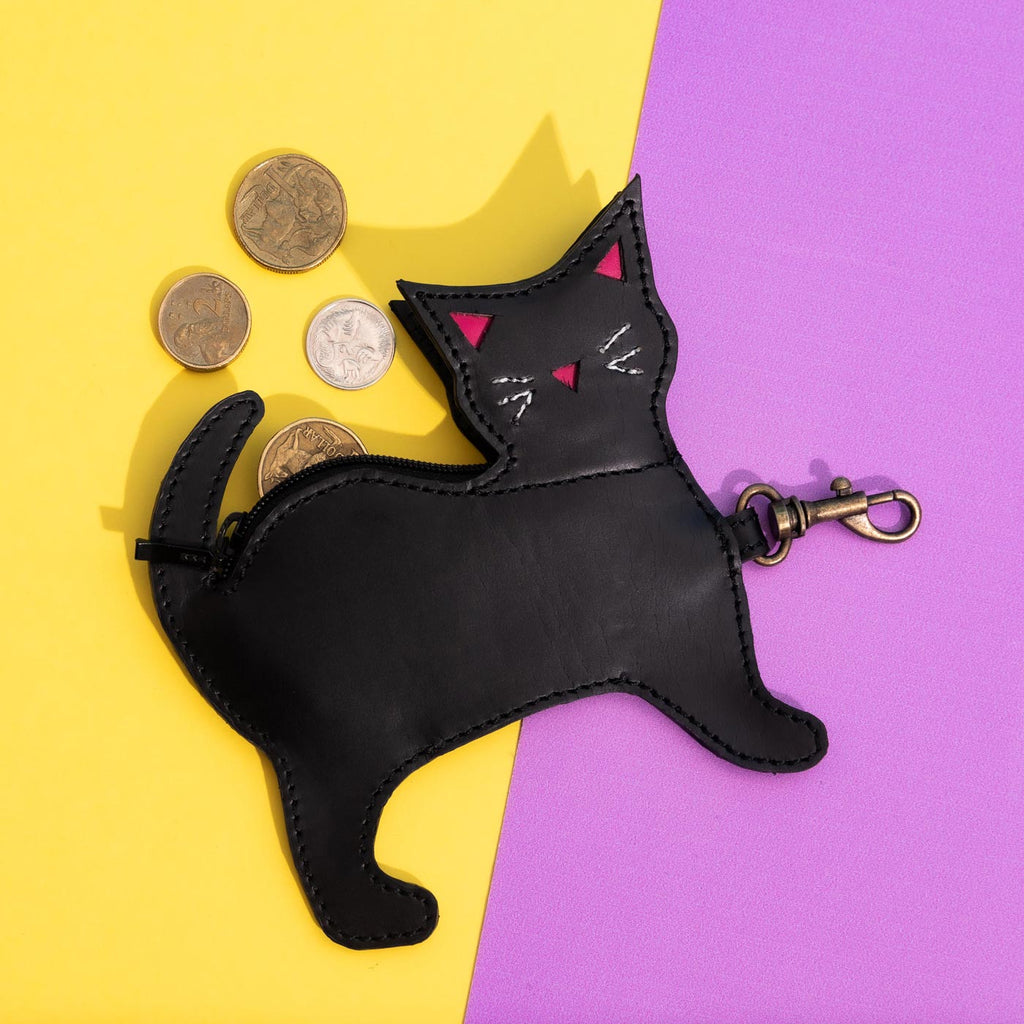 Wicker Darling fortuna the cat coin purse leather black cat coin purse sits in a colourful background