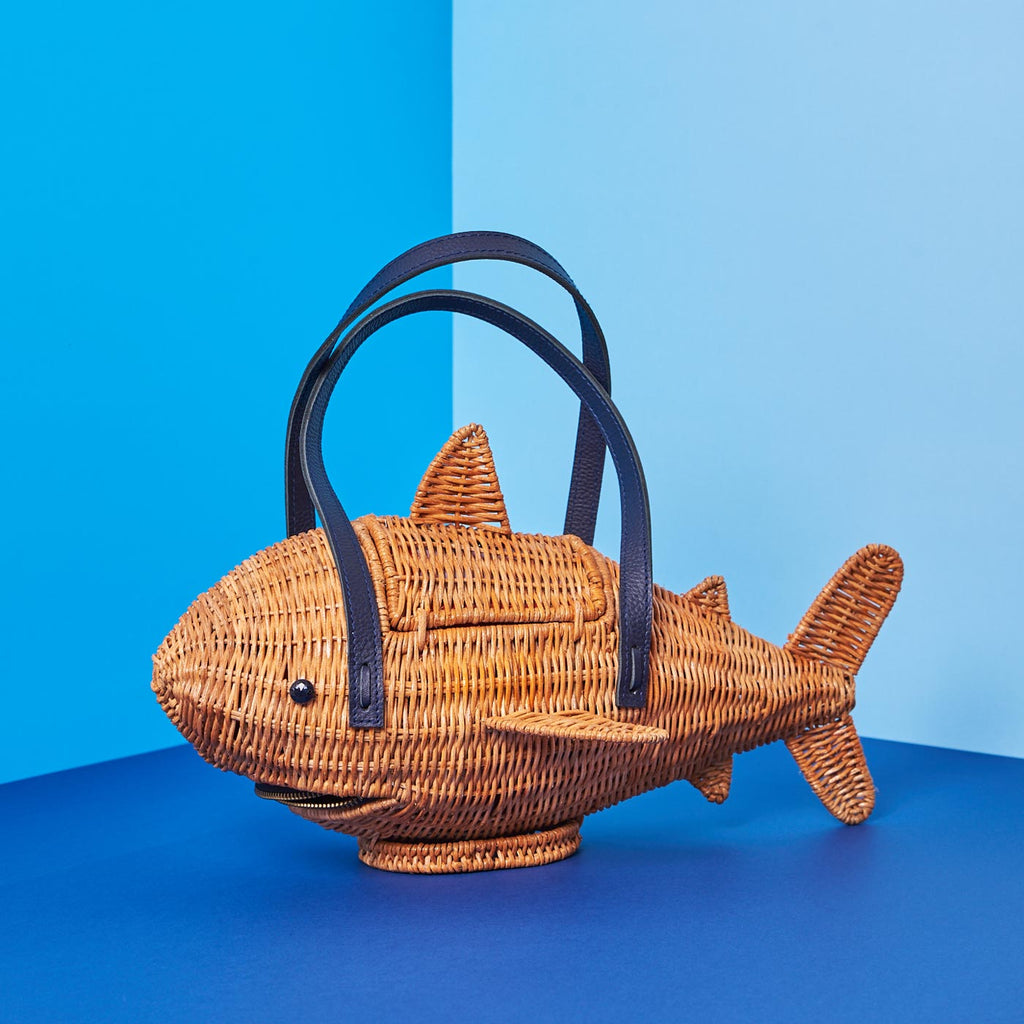Wicker Darling marcus the sharkus shark purse marcus darling sits in a blue space