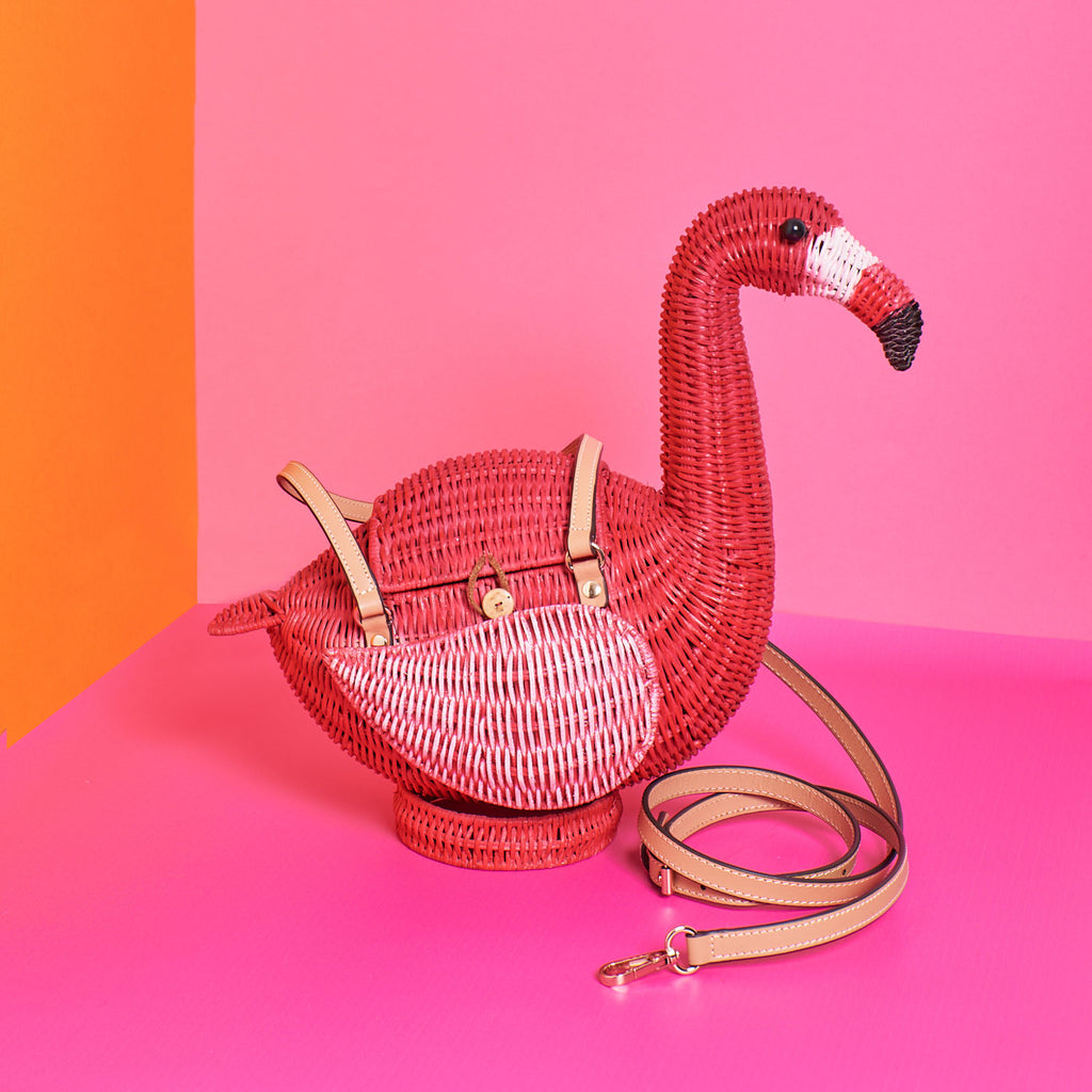 Wicker Darling monty flamingo montoya Flamingo purse bird purse sits in a colourful background