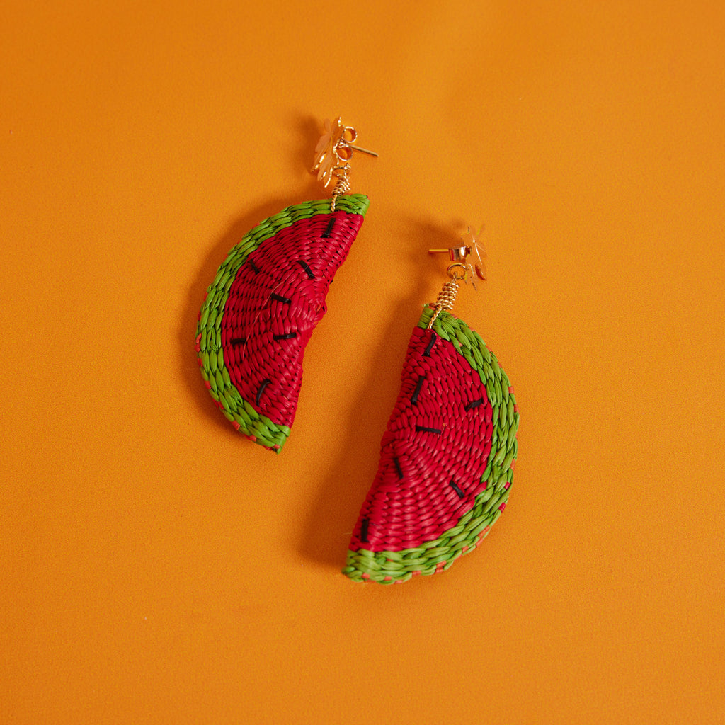 Wicker Darling Casa Bonita collab Woven Watermelon earrings sit on a colourful background